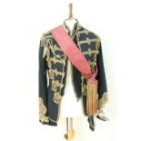 A Hussars officer's dress tunic, waistcoat and sash, bearing a label inscribed Capt A B Broadhurst