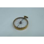 A George III pocket magnetic compass by W & S Jones of Holborn, London, in gilt metal case and