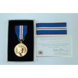 A Royal Mint Queen's Golden Jubilee Medal, cased