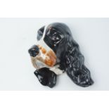 A Fielding's Crown Devon "Exquisite Model of Ware" spaniel wall plaque, [Exquisite Model of Ware was