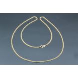 A high carat yellow metal faceted curb link long neck chain, stamped 750 and tested as gold, 70