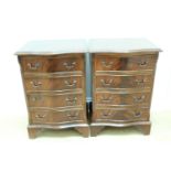 A pair of late 20th Century reproductions Georgian mahogany serpentine-fronted chests of drawers, of