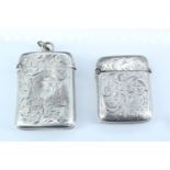 Two Victorian silver Vesta cases, of typical form, the latter's engraved decoration incorporating