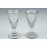 A pair of late Georgian toasting glasses having deceptive bowls, 10 cm