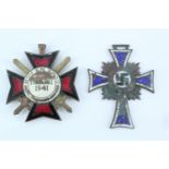 A Second World War Dutch Waffen-SS Eastern Front Mussert cross medal, (a/f), together with a relic