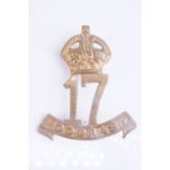 An Indian Army 17th Dogra Regiment cast cap badge