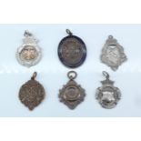 Six early 20th Century silver and bronze presentation fob medals, including a bronze London