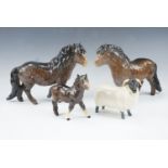 Two Beswick Shetland ponies together with foal and ram