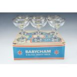 Six Babycham glasses in original carton