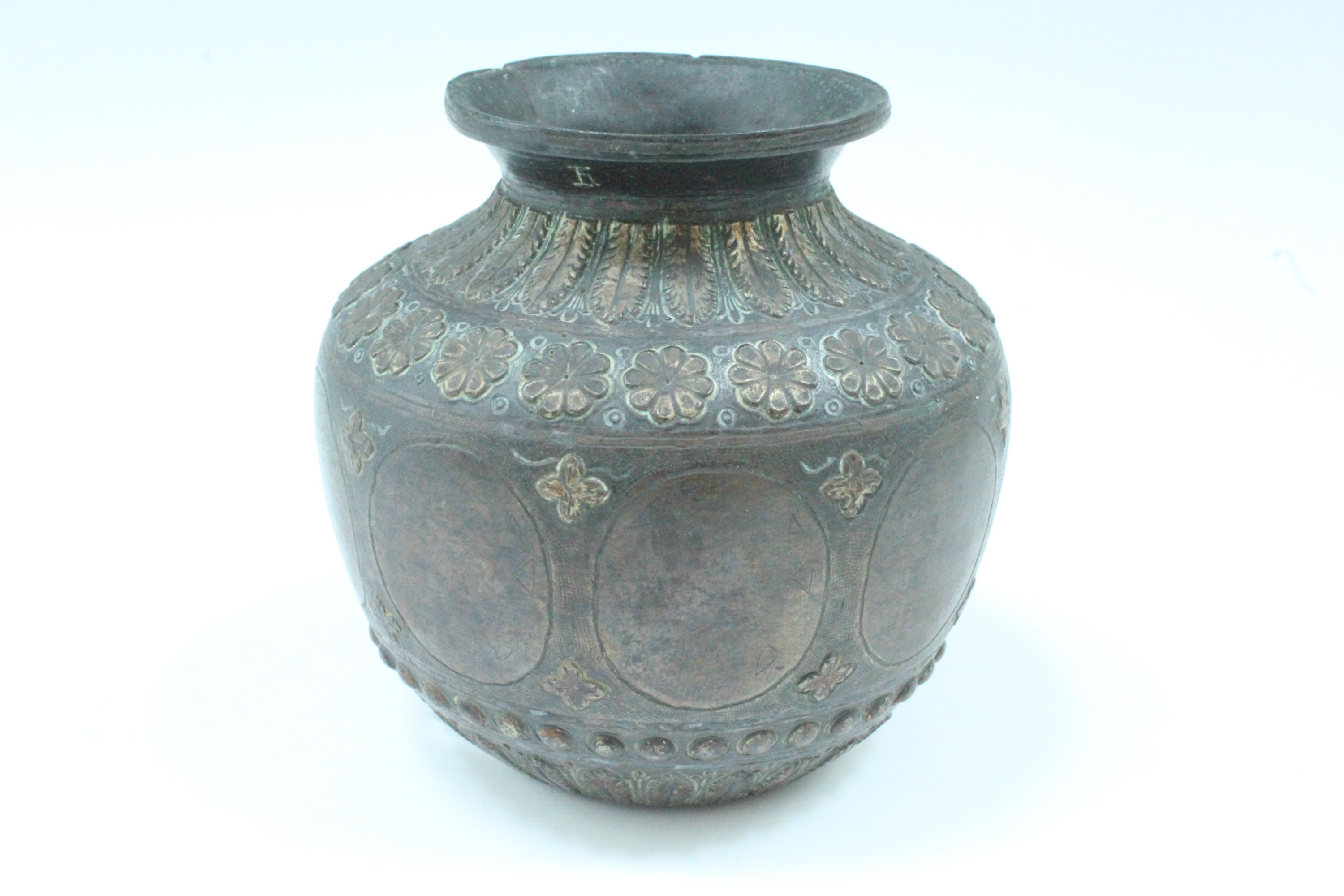 An Ottoman or Middle Eastern chiselled bronze vase, of compressed shouldered form with everted - Image 2 of 2