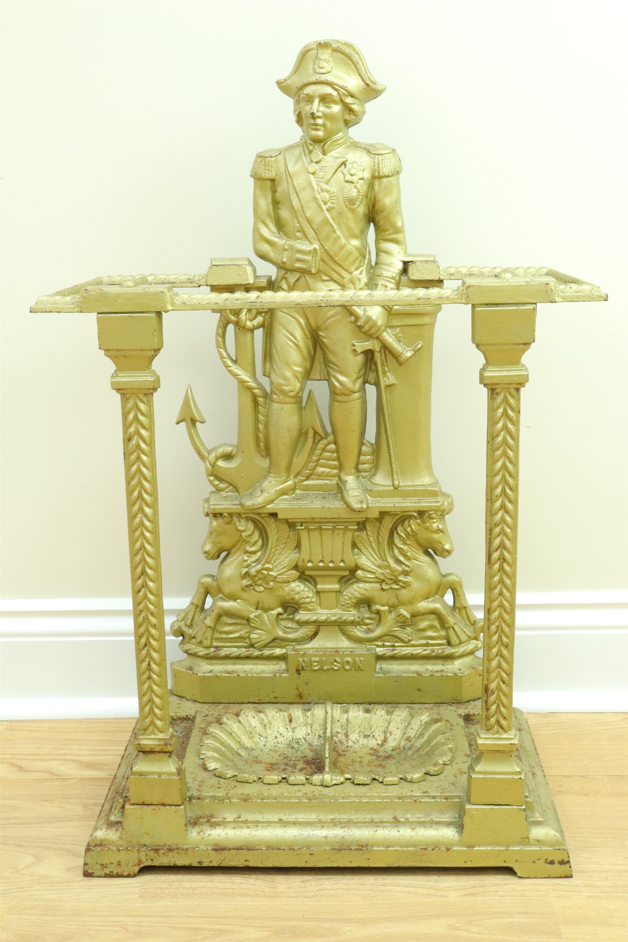 An Edwardian cast iron stick and umbrella stand commemorating Admiral Lord Nelson, 78 cm x 49 cm x