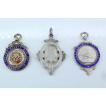 Three silver and enamel fob medals, relating to Hern Bay regatta, 1909, Cobden Rowing Club, 1934 and