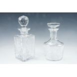 An Edinburgh Crystal decanter together with a traditional cut glass spirit decanter having a