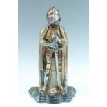 A 1950s kitsch anodised iron fireside companion set modelled as a medieval knight, 37 cm
