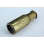 A Second World War escape and evasion / SOE miniature single draw brass telescope, 31 mm closed