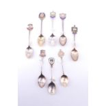 8 silver and enamelled silver souvenir teaspoons, relating to the North West including Blackpool,