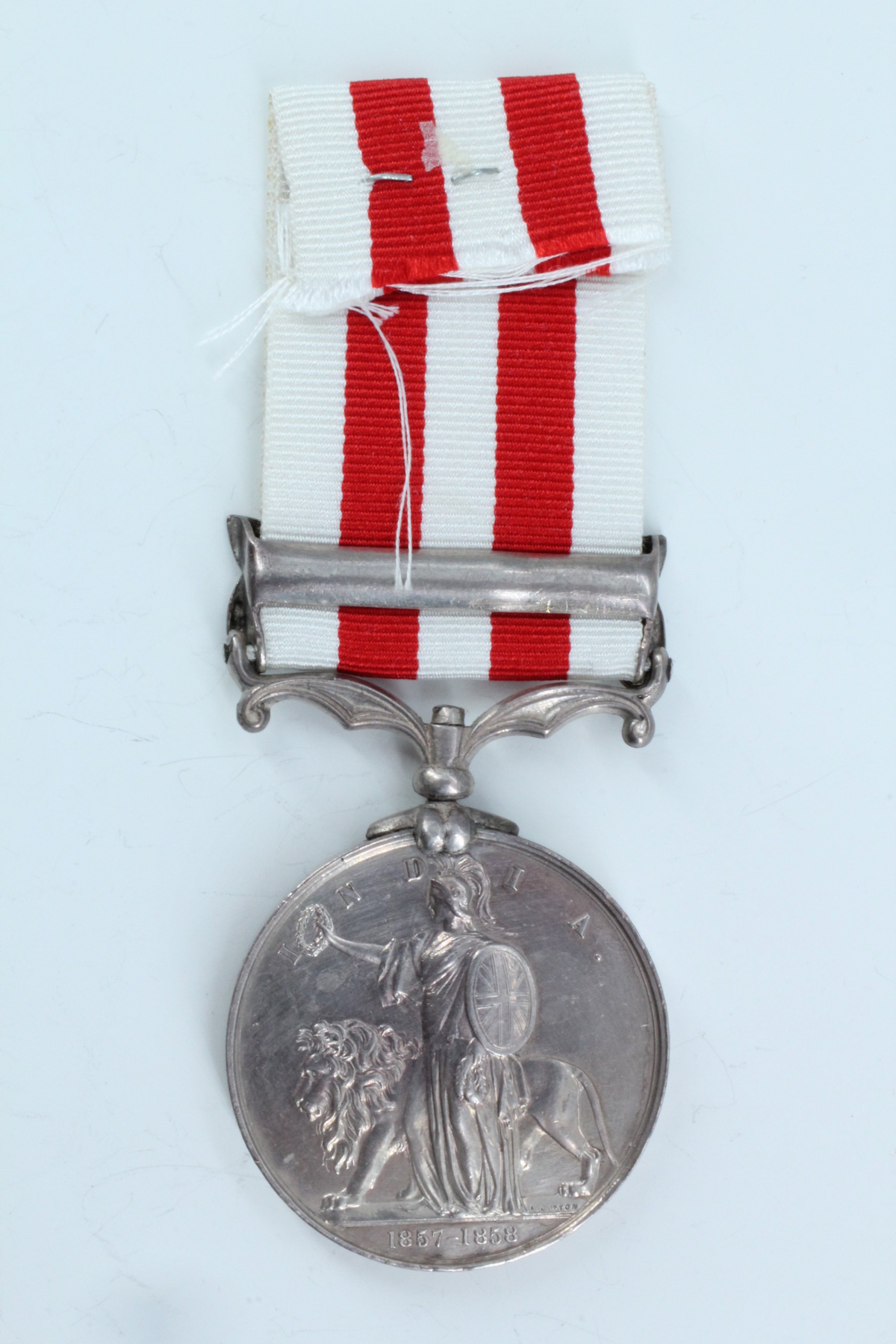 An Indian Mutiny medal with Lucknow clasp impressed to Ens H P Evans, Attd to H M 34th Regt - Image 2 of 5