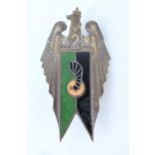 A Second World War Free Polish Army 2nd Motorized Artillery Regiment enamelled breast badge