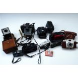 Sundry vintage cameras, including a Kodak "Brownie Model I" box camera, a Polaroid Land Camera, a "
