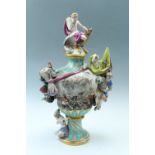 A Meissen monumental covered porcelain urn emblematic of war (fire) modeled by J.J. Kaendler, the