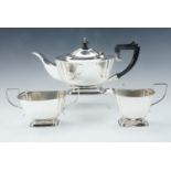 An Art Deco electroplate three piece tea service, teapot 15 cm high