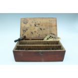 A late 19th / early 20th Century cased brass letters and numbers stencil set