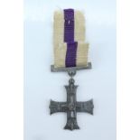 A miniature Military Cross medal
