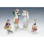 A pair of Sitzendorf Rococo influenced early 20th Century porcelain figurines, comprising husband