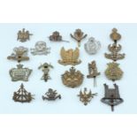 A quantity of cavalry cap and other badges