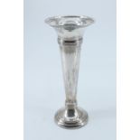 An early 20th Century trumpet shaped silver vase, of plain tapering form having bands of reeded