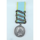 A Crimea Medal with three clasps engraved to ES Harvey, 55th Regt