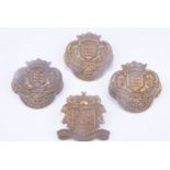 Four early 20th Century Lancashire volunteers cap badges