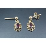 A pair of 9 ct gold and almandine ear pendants, 15 mm drop, 1.2 g