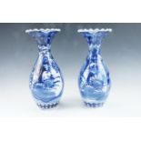 A pair of 20th Century Japanese blue and white porcelain vases, of baluster form with everted