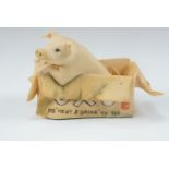 A Border Fine Arts figure of a pig sitting in a OXO box, 7 cm