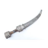 A fine late 19th / early 20th Century Middle Eastern jambiya dagger, the hilt bound in finely