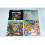 Four The Beatles LP records comprising 'A Collection of Beatles Oldies', 'Sgt Peppers Lonely