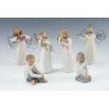 Six Willow Tree figurines