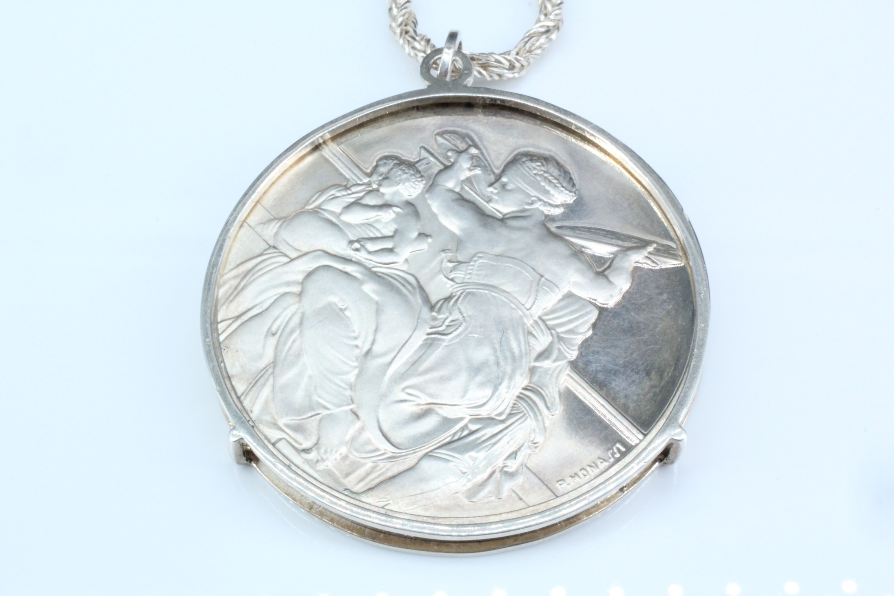 A 1970s Sistine chapel silver medallion necklace, comprising a medallion from the "Genius of - Image 2 of 3