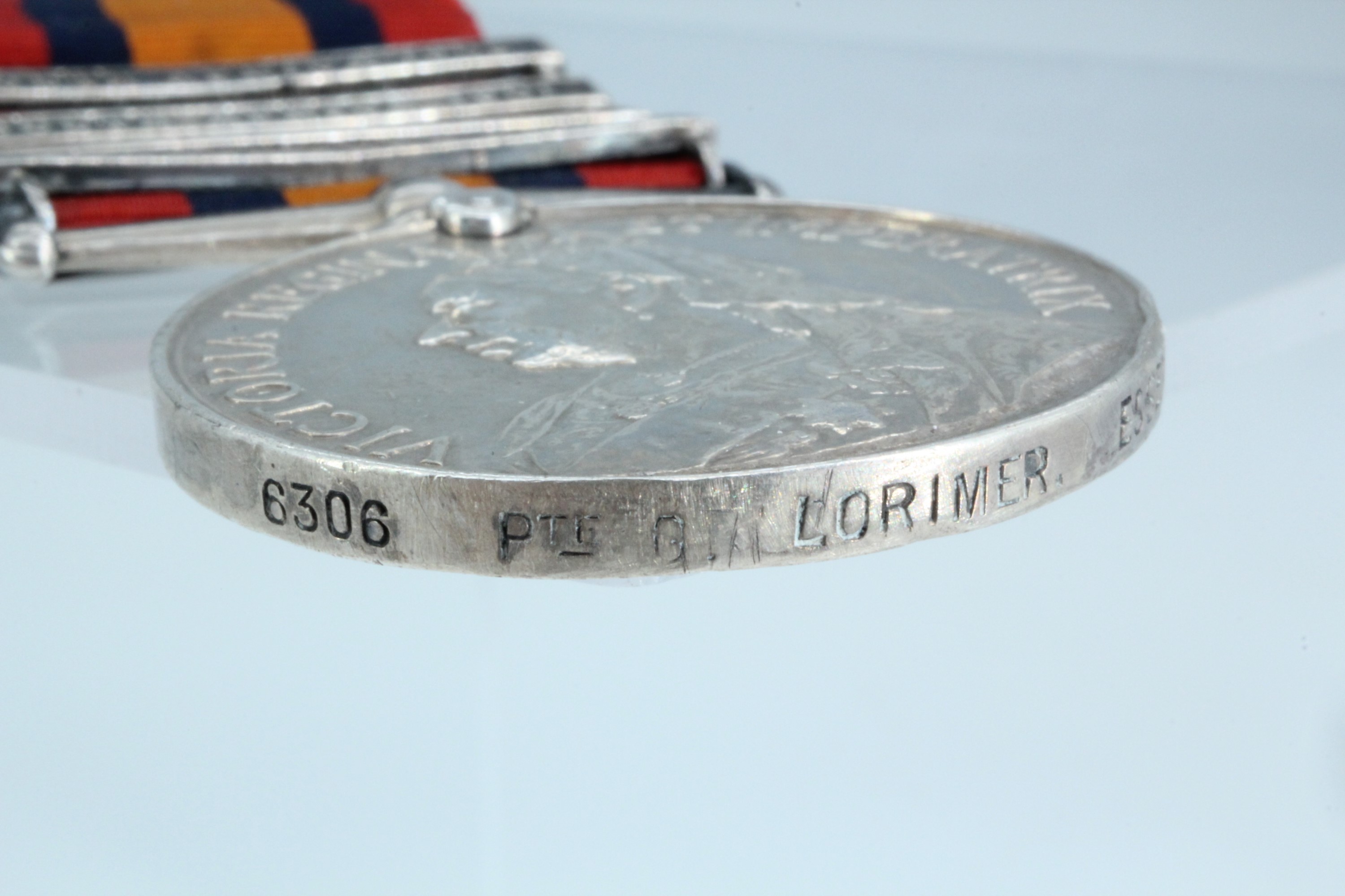 A Queen's South Africa medal with four clasps to 6306 Pte G Lorimer, Essex Regt - Image 3 of 4