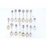 14 silver and enamelled silver souvenir teaspoons, relating to the South West including Weymouth,