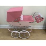 A contemporary Silver Cross doll's pram, 93 cm x 40 cm x 97 cm