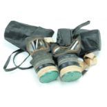 Two Second World War British Home Front civilian gas masks in commercial faux leather hand bag