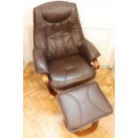 An Ekornes Stressless or similar brown hide upholstered recliner armchair and Ottoman