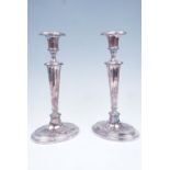 A pair of old electroplate Adam style candlesticks, 31 cm