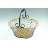 A cane and metalwork basket, 45 x 34 x 37 cm