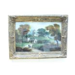 Two Victorian landscapes, reverse painted on glass, both having rivers with scattered buildings, a