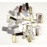 A quantity of vintage gas roller cigarette lighters, including Flick, Ronson etc