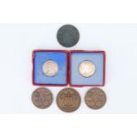 A cased 1935 George V silver jubilee medallion, together with a similar 1937 George VI coronation