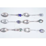 Six silver and enamelled silver souvenir teaspoons, relating to guns / shooting / rifle clubs, 101